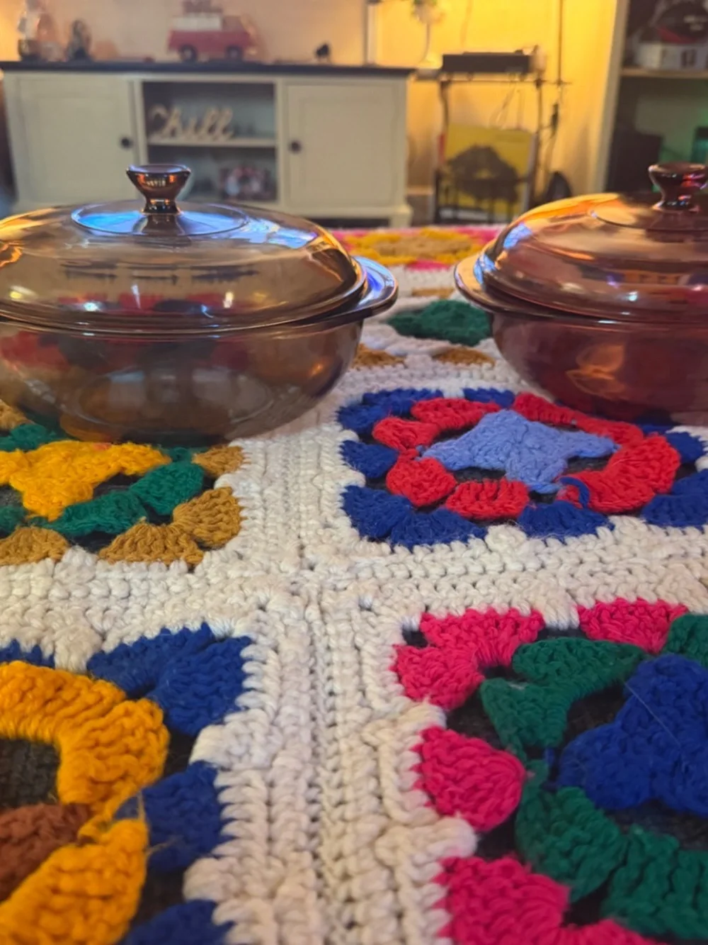 vintage Pyrex casserole dishes in gorgeous amber and cranberry glass